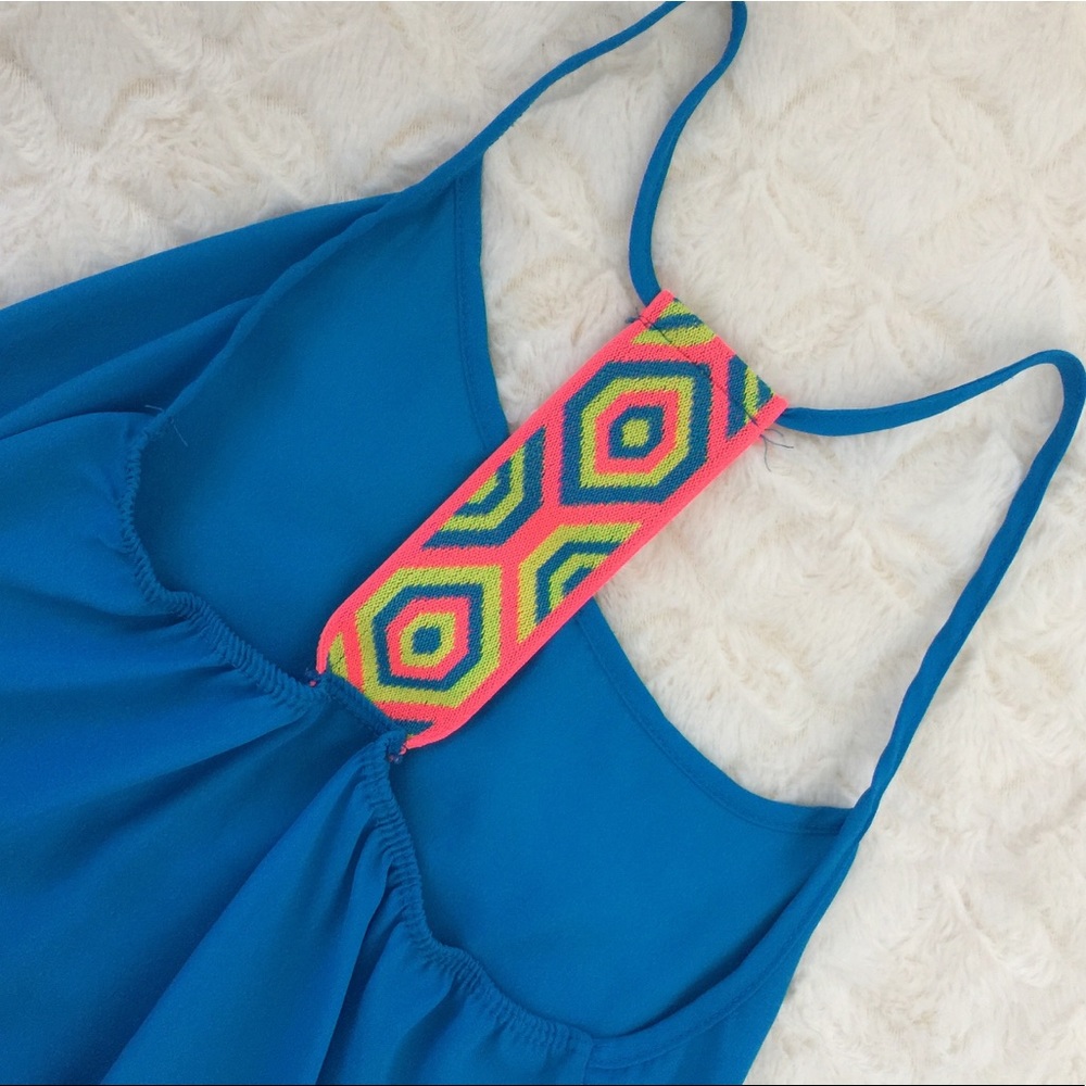 Bright blue tank top. Neon strap back.